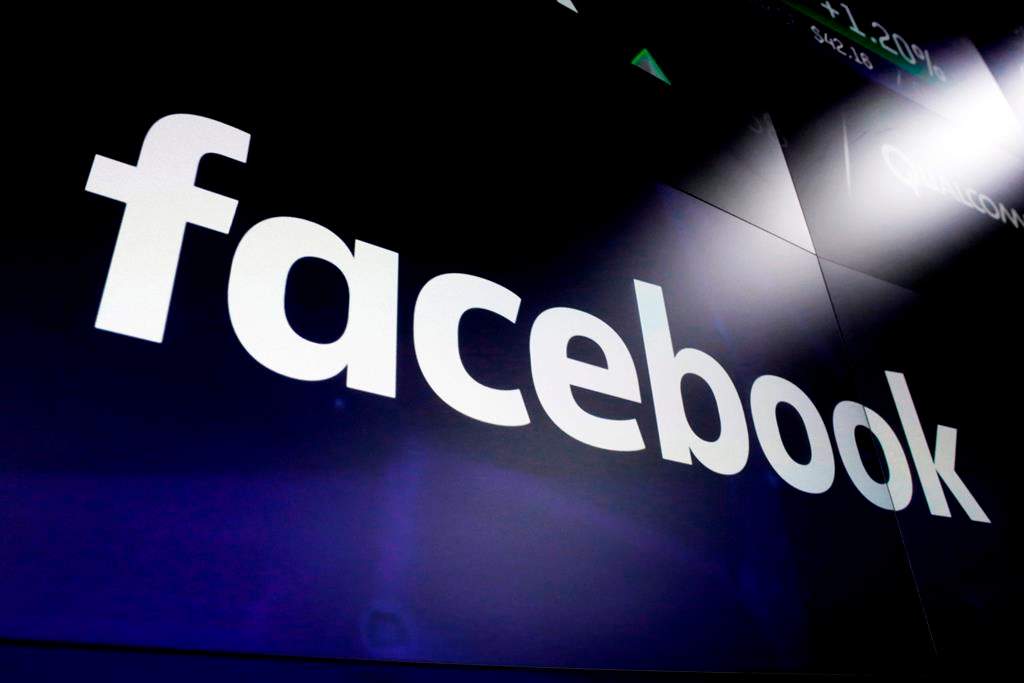 This March 29, 2018 file photo, shows logo for social media giant Facebook at the Nasdaq MarketSite in New York's Times Square.THE CANADIAN PRESS/AP-Richard Drew.