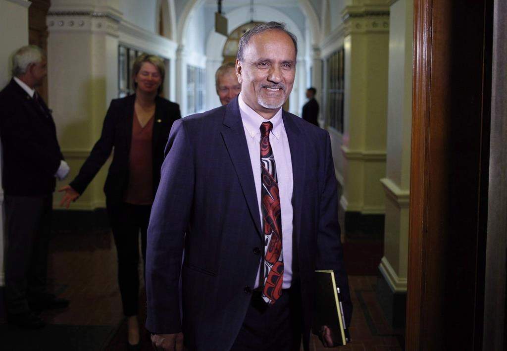 Surrey-Newton NDP MLA Harry Bains arrives to the start of the debate at B.C. Legislature in Victoria on June 26, 2017. Workers' compensation benefits in B.C. would be based on a higher maximum salary amount under legislation introduced Tuesday by the provincial government. THE CANADIAN PRESS/Chad Hipolito.