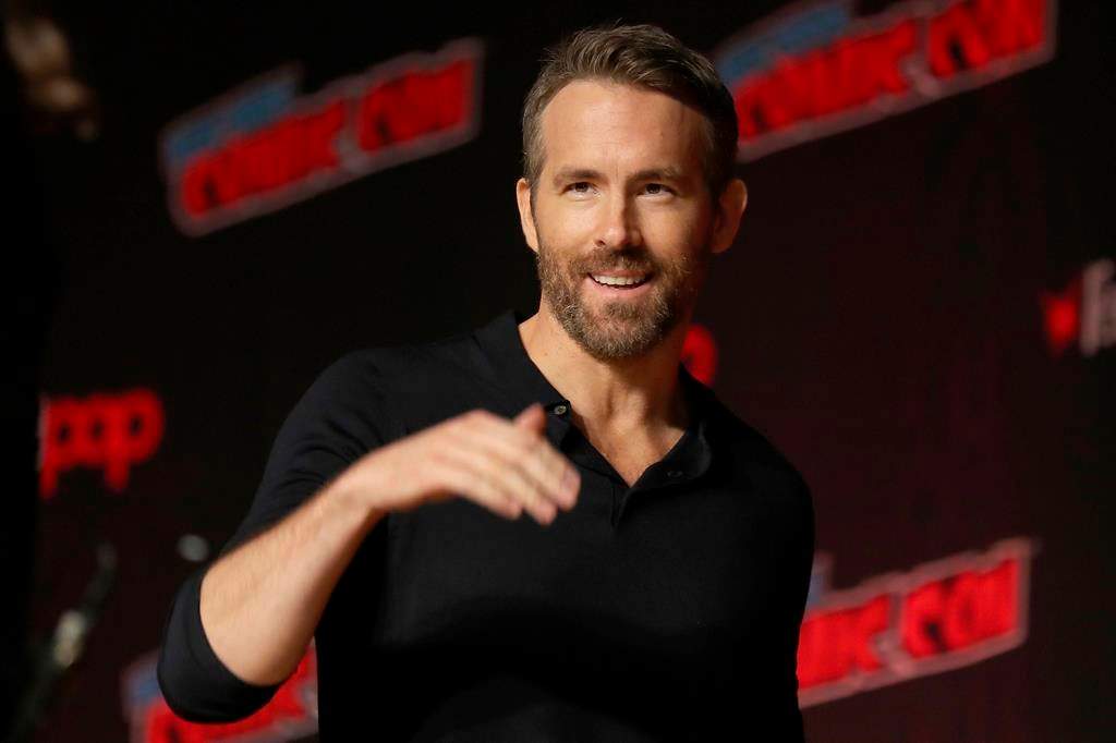 Ryan Reynolds is seen at New York Comic Con, in New York City, Oct. 3, 2019. The Vancouver-born "Deadpool" actor announced plans on Friday for the Group Effort Initiative, which will recruit 10 to 20 trainees from Black, Indigenous and "all other marginalized communities" to work alongside experienced professionals on his next movie. THE CANADIAN PRESS/AP-Steve Luciano.