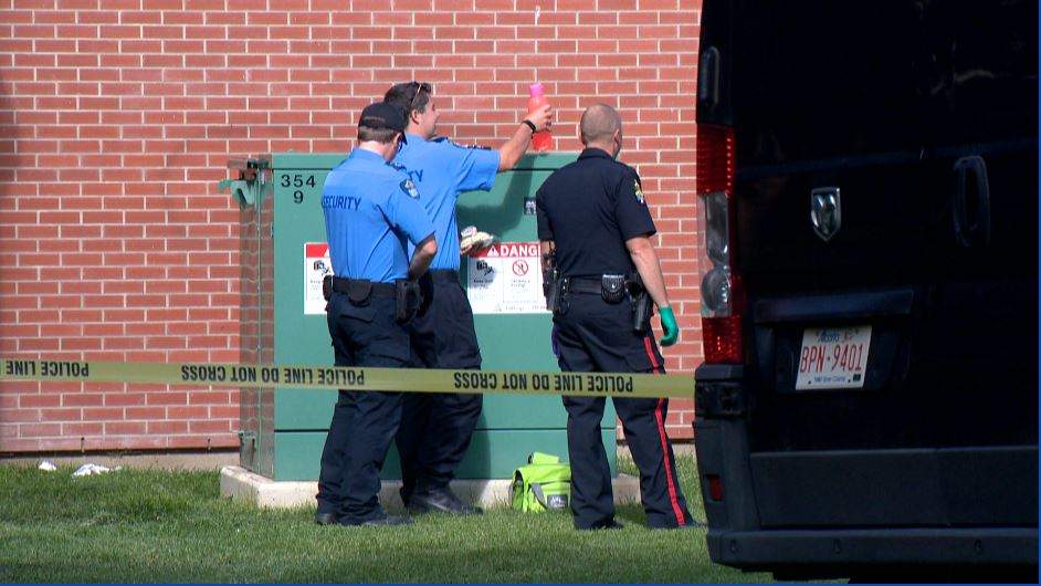 Lethbridge police investigate the sudden death of a woman in Galt Gardens on Wednesday. 