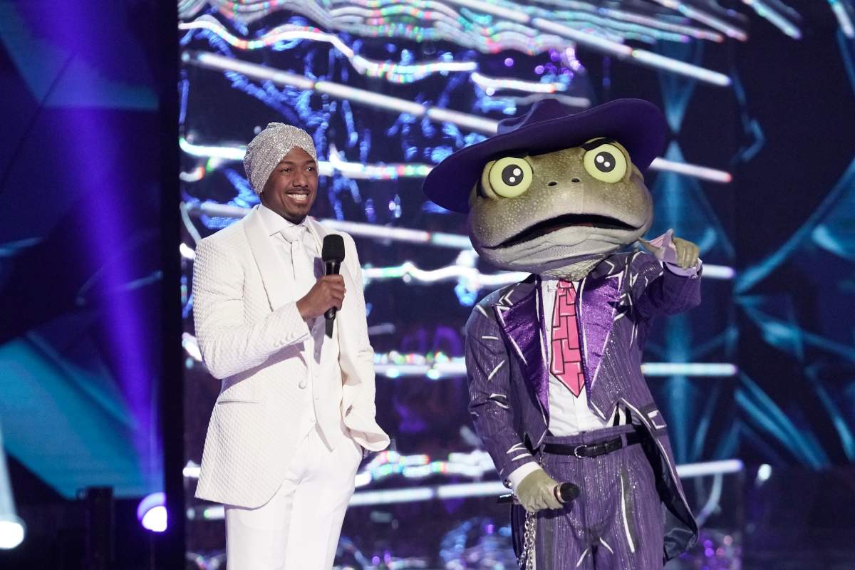 'The Masked Singer' host Nick Cannon and The Frog in the all-new 'Couldn't Mask for Anything More: The Grand Finale!' season finale episode.