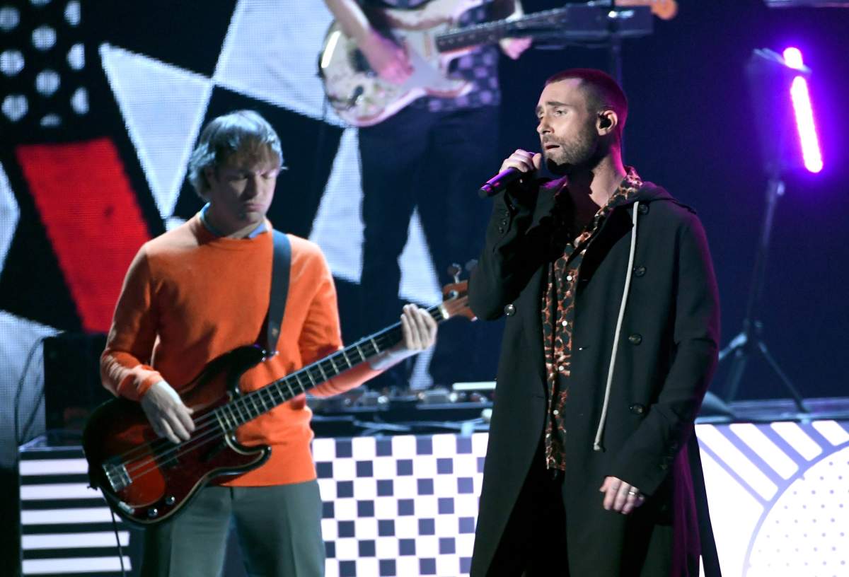 Mickey Madden (L) and Adam Levine of Maroon 5 perform on stage during the 2018 iHeartRadio Music Awards, which broadcasted live on TBS, TNT and truTV at The Forum on March 11, 2018 in Inglewood, Calif.