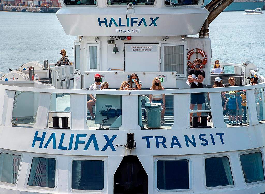 Passengers on a Halifax Transit ferry as it arrives in Dartmouth, N.S. on Friday, July 24, 2020.