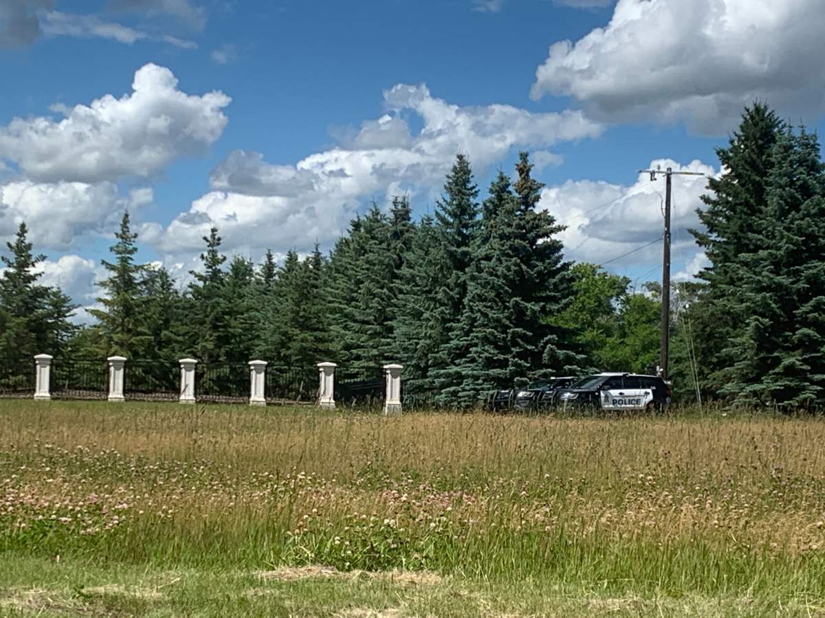 Edmonton police investigate the suspicious death of a man at a rural residence in the area of 184 Street and 8 Avenue SW Friday, July 17, 2020.