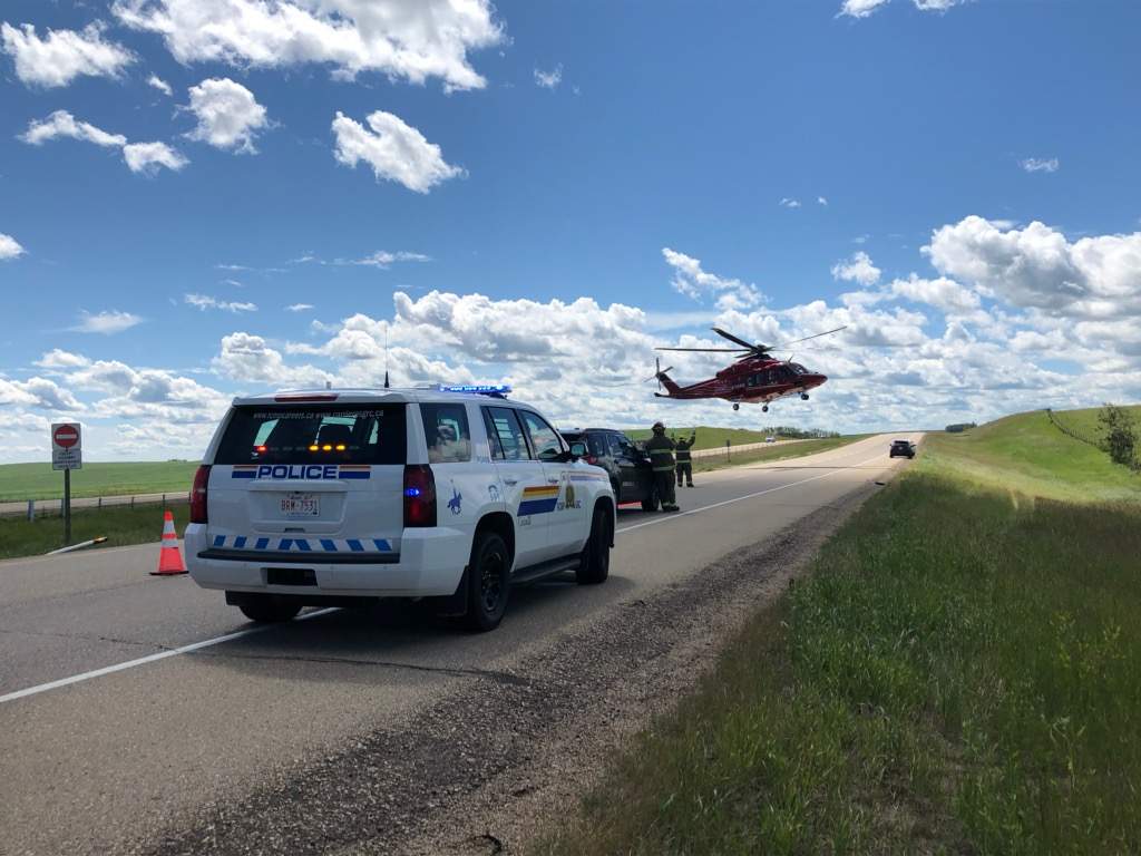STARS Air Ambulance takes off from a crash site near Ponoka along the QEII highway in Alberta on July 10, 2020. 