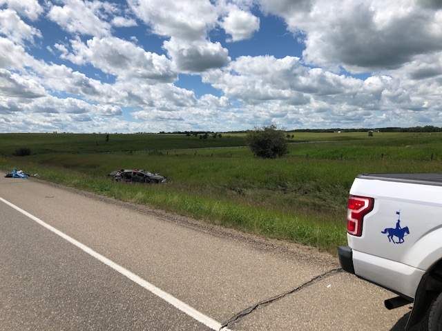 A vehicle is seen beside the QEII highway in central Alberta. RCMP were called to the collision the morning of July 10, 2020.