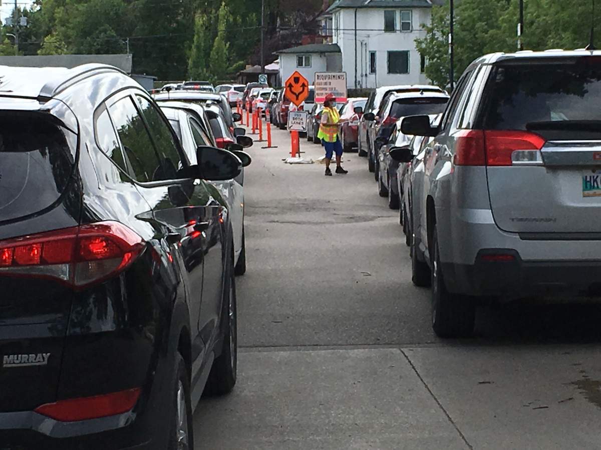 The testing site lineup at Winnipeg's 1284 Main St. facility on Monday.