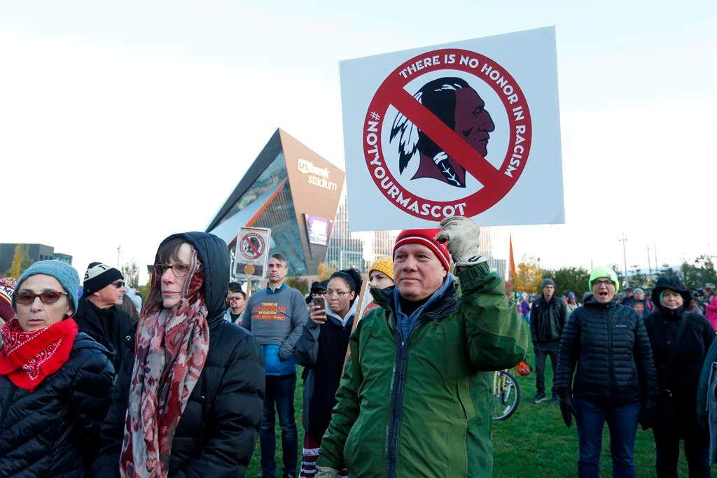 Native American leaders protest against the Washington Redskins team name outside U.S. Bank Stadium in 2019.