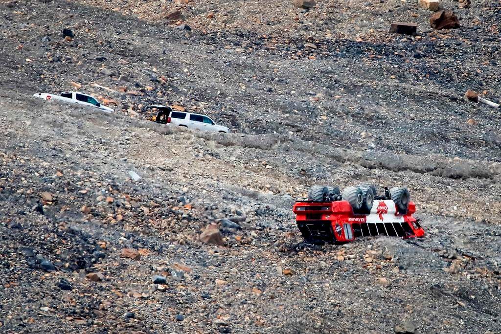 RCMP attend the scene of a sightseeing bus rollover at the Columbia Icefields near Jasper, Alta., Sunday, July 19, 2020.