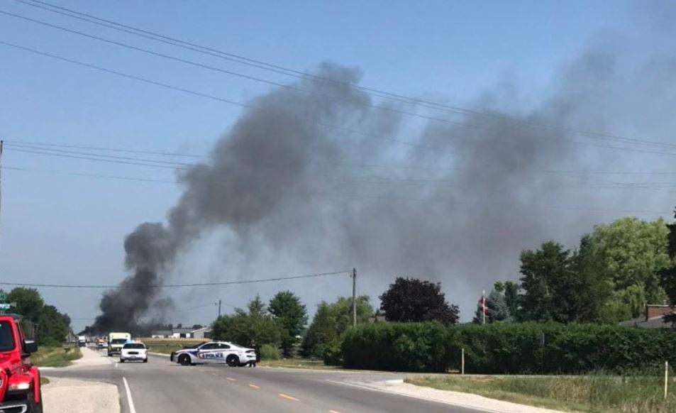 Plumes of dark smoke were seen over the crash site on July 8, 2020. Photo via @babsmommy/Twitter.
