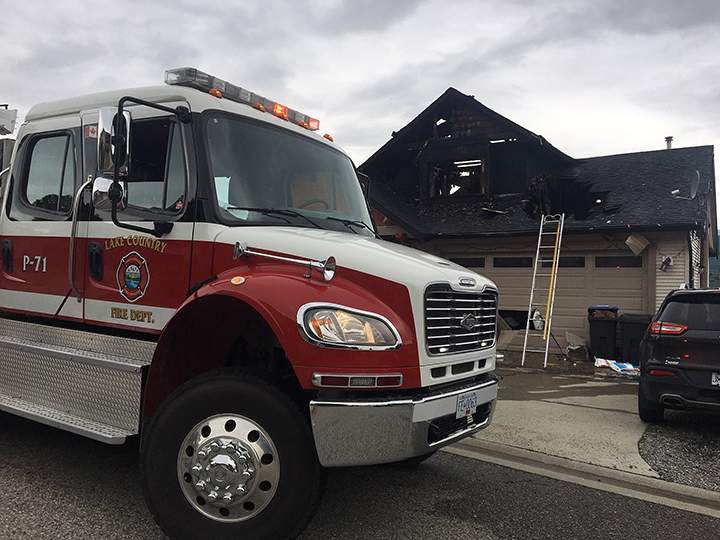 Four people were home at the time when a fire on the deck woke up the owner at 5:30 a.m.