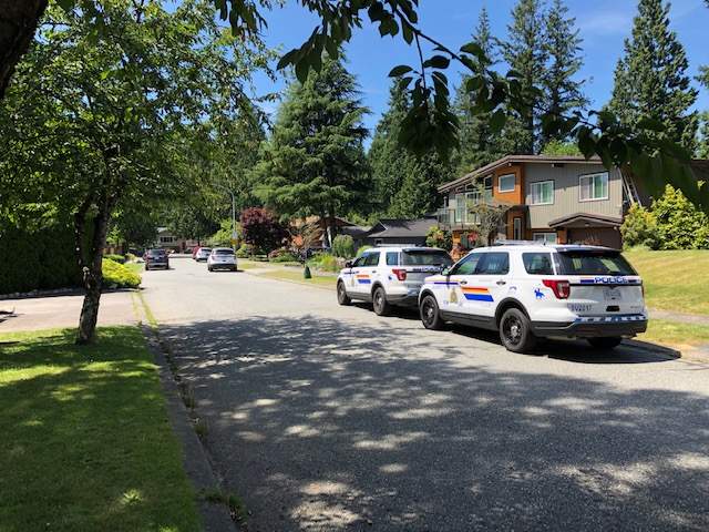 RCMP at the scene of a suspicious fire and death on the Surrey-Langley border on Wednesday, July 15, 2020. 