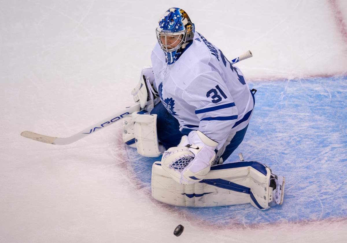 Toronto Maple Leafs goaltender Frederik Andersen (31) makes a save against the Montreal Canadiens during second period NHL exhibition hockey action ahead of the Stanley Cup playoffs in Toronto on Tuesday, July 28, 2020.