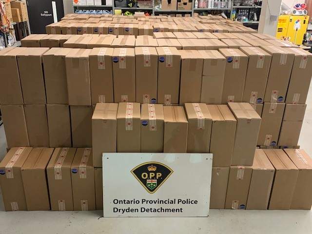 Hundreds of cases of illegal cigarettes Ontario Provincial Police say they discovered during a traffic stop Sunday.
