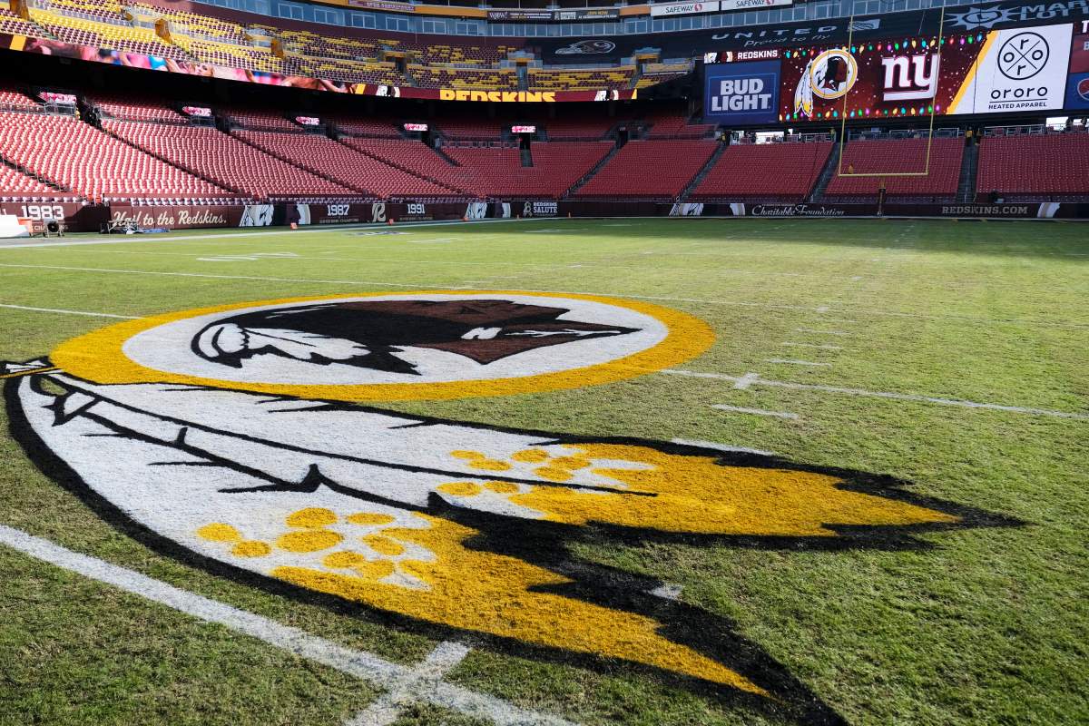 The Washington Redskins logo is seen on FedEx Field prior to an NFL football game between the New York Giants and the Redskins in Landover, Md.