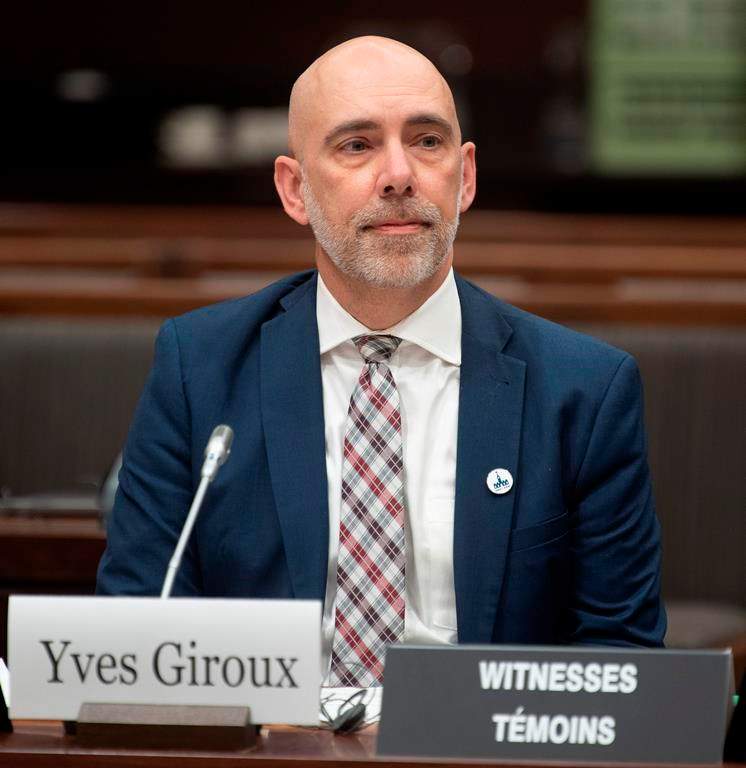 Parliamentary Budget Officer Yves Giroux waits to appear before the Commons Finance committee on Parliament Hill in Ottawa, Tuesday, March 10, 2020.