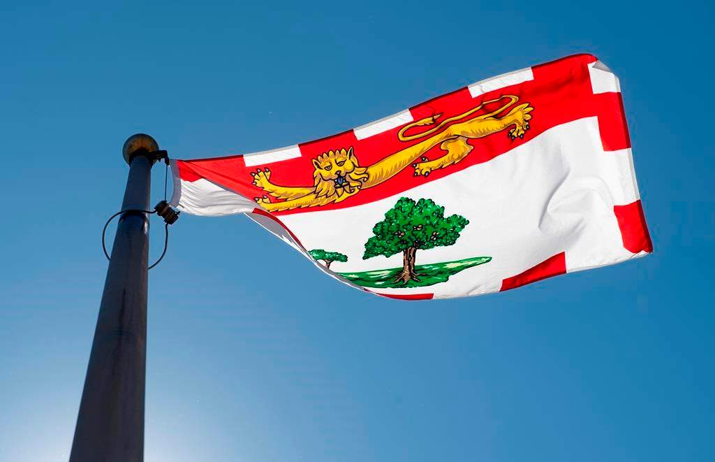 Prince Edward Island's provincial flag flies on a flag pole in Ottawa, Monday, July 6, 2020. Another essential worker has tested positive for COVID-19 on Prince Edward Island. THE CANADIAN PRESS/Adrian Wyld.