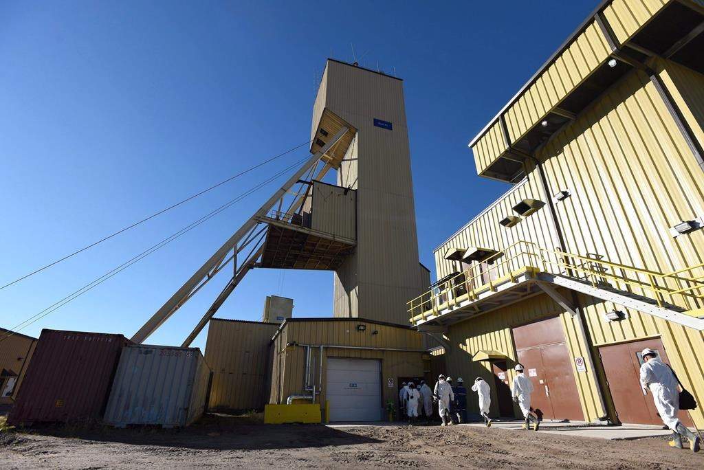 Media enter the head frame during a Cameco media tour of the uranium mine in Cigar Lake, Sask. Wednesday, September 23, 2015.