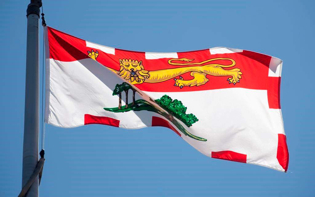 Prince Edward Island's provincial flag flies on a flag pole in Ottawa, Monday, July 6, 2020. Health officials in Prince Edward Island say there are now no active cases of COVID-19 in the province. THE CANADIAN PRESS/Adrian Wyld.