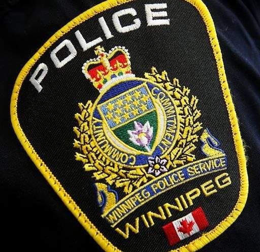 A Winnipeg Police Service shoulder badge on an officer is shown in Winnipeg.