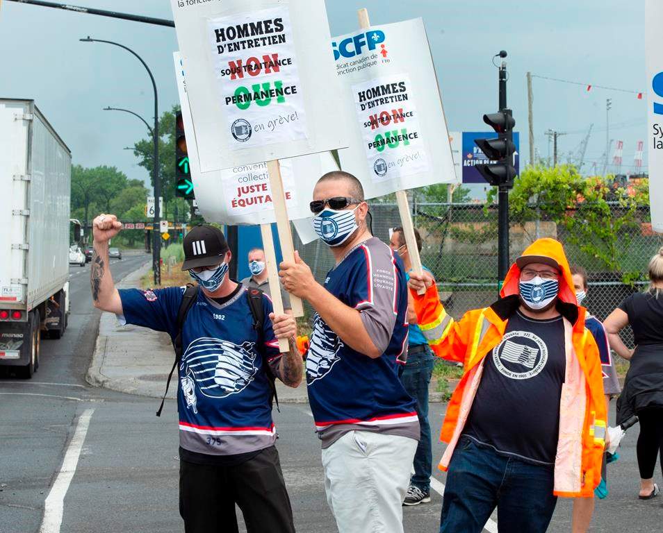 FILE: Striking Port of Montreal workers conducted a four-day walkout on Monday, July 27, 2020 in Montreal.