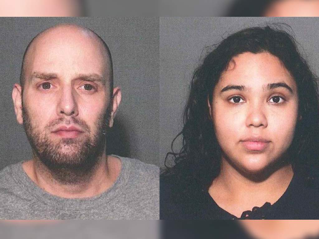This combination of July 2020 photos provided by the Stonington, Conn., Police Department, shows Philip Sarner, left, and Emily Orbay. The New York couple has been released on bond after being charged with assaulting a 59-year-old hotel worker in Mystic, Conn., in what police say was a hate crime.