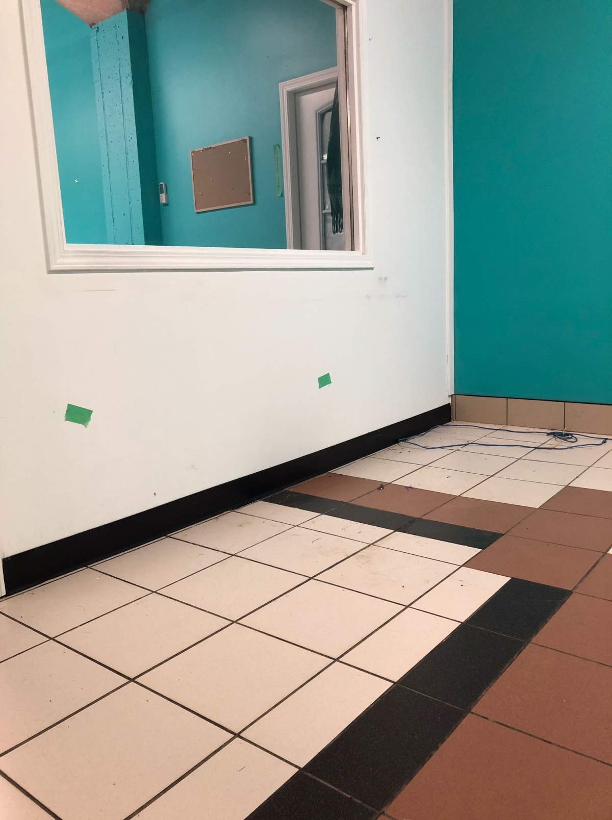 Water in the latest flood came up to the tape marks.