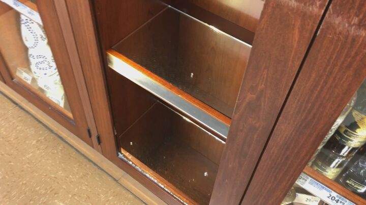The liquor cabinet where the high-end bottles of liquor were kept. Credit: Global News
