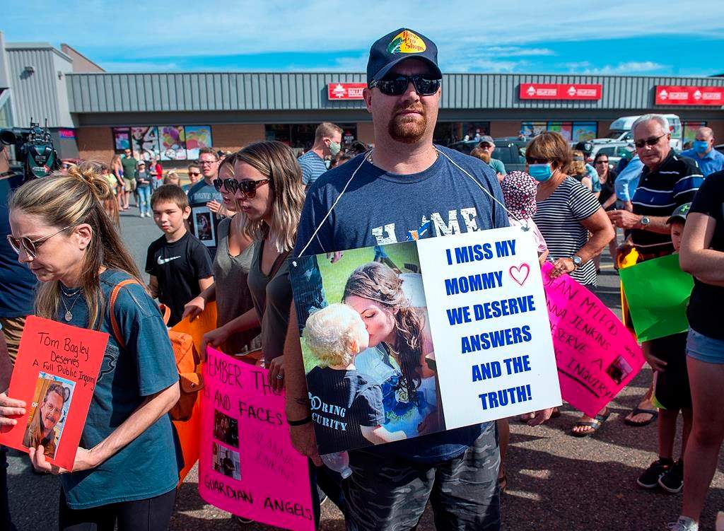 Nick Beaton, whose wife Kristen Beaton was killed in the April mass shooting, attends a march organized by families of victims demanding an inquiry into the crimes in Nova Scotia that killed 22 people, in Bible Hill, N.S. on Wednesday, July 22, 2020.THE CANADIAN PRESS/Andrew Vaughan.