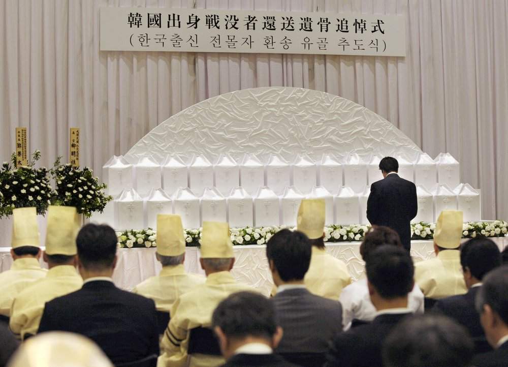A ceremony to commemorate the returning to South Korea the remains of Korean solders who died while serving in the Japanese Army during World War II, is held at Buddhist temple, Yutenji, in Tokyo on May 18, 2010. About 700 remains of the Korean war-dead have been separately stored at the temple. Health and welfare ministry officials say they are the only remains of the former Korean soldiers that they are aware of. More than half of the 700 are from North Korea. Several hundred remains had been previously returned to their homes through diplomatic arrangement, but talks have been stalled in recent years as diplomatic relations have soured over Japan’s wartime actions.