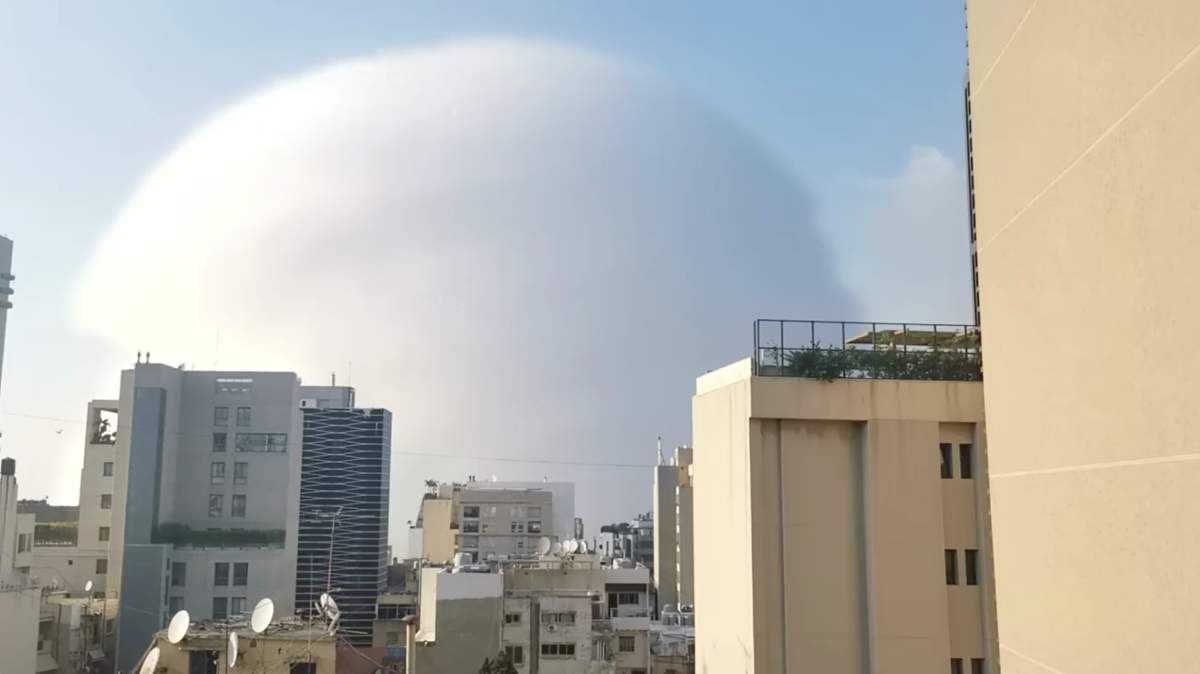 A shockwave is seen during an explosion in Beirut, Lebanon, Aug. 4, 2020, in this picture obtained from a social media video.