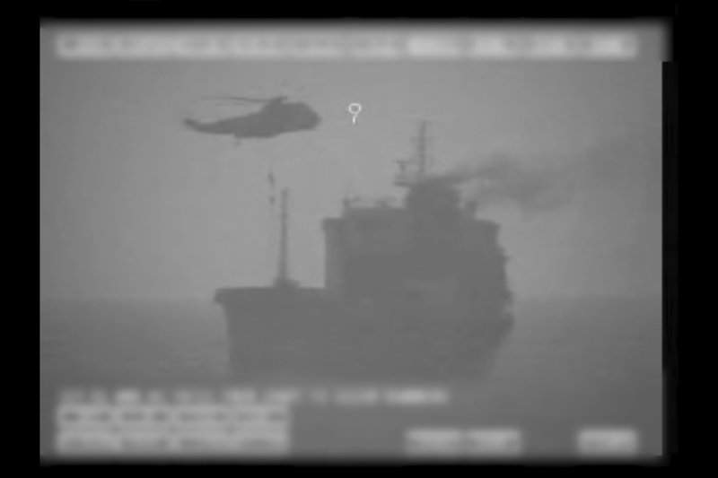 In this image made from video released by the U.S. military's Central Command, Iranian commandos fast-rope down from a helicopter onto the MV Wila oil tanker in the Gulf of Oman off the coast of the United Arab Emirates on Wednesday, Aug. 12, 2020. 