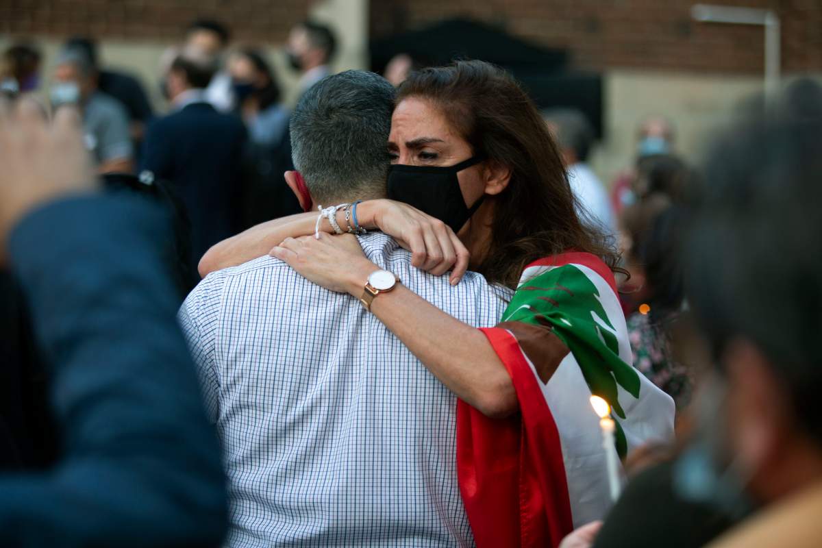 Lebanese Montrealers attend candlelight vigil at the Lebanese consulate in Montreal to pay tribute to victims of the deadly explosion in Beirut