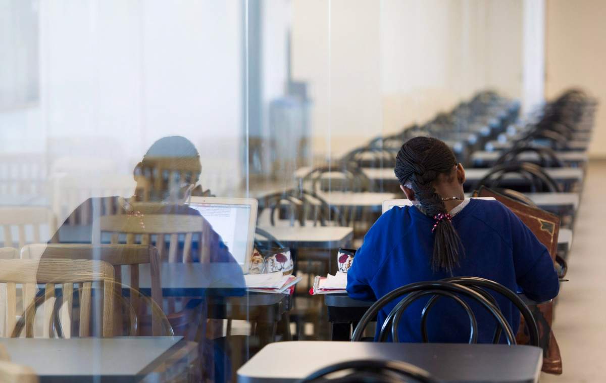 A young woman studies at the College de Maisonneuve in Montreal, Sunday, March 13, 2016. 