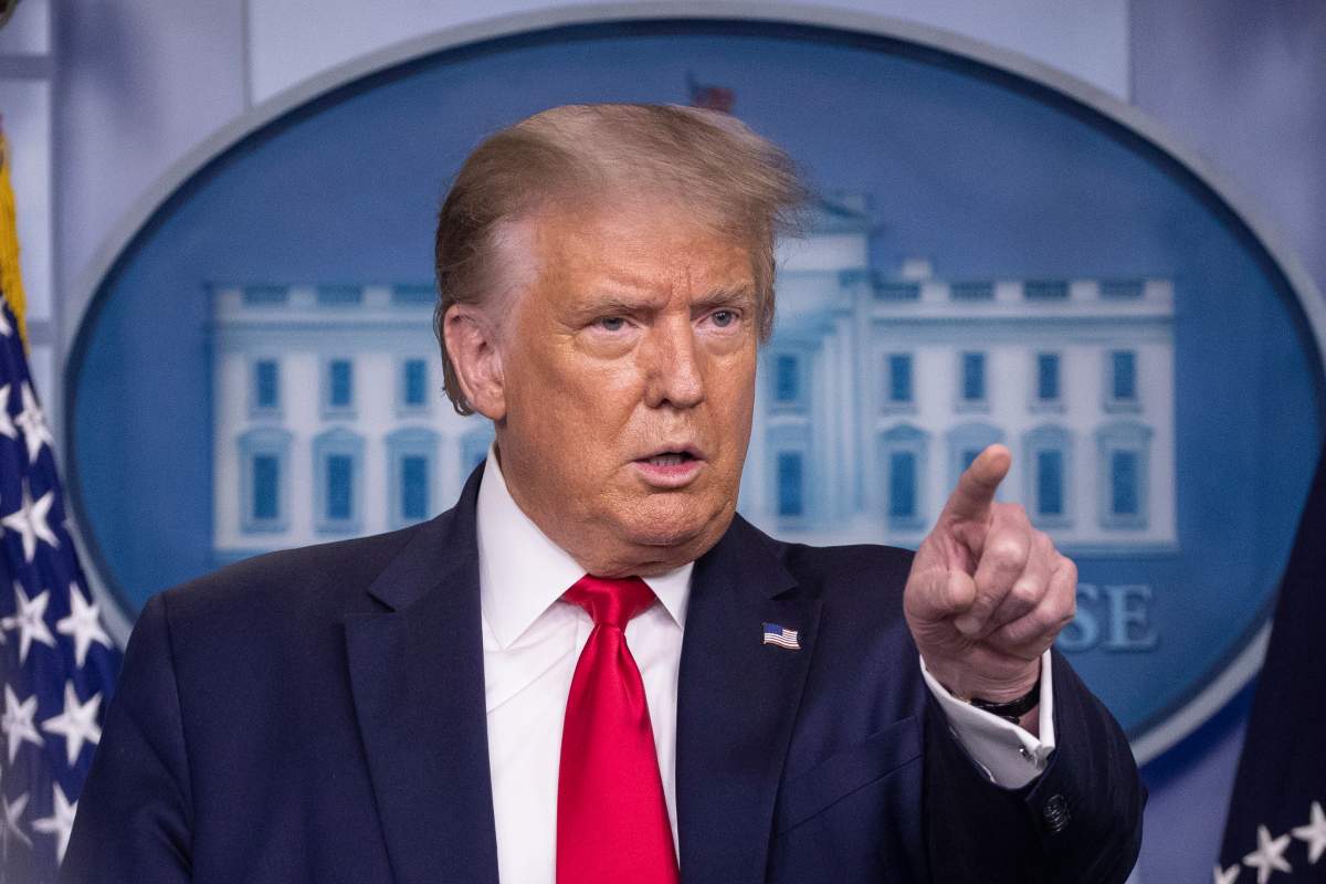 FILE - U.S. President Donald Trump points to a question as he speaks during a briefing with reporters in the James Brady Press Briefing Room of the White House, in Washington.