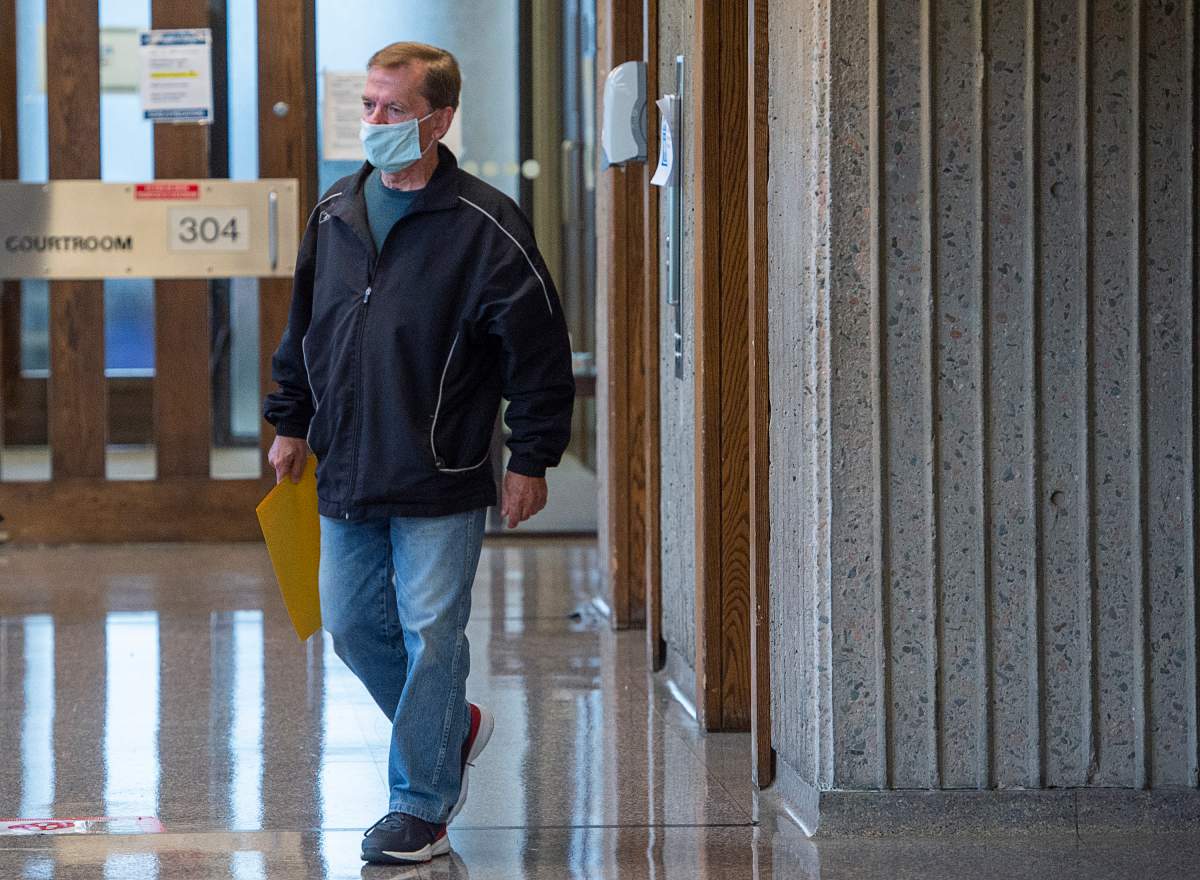 Michael Patrick McNutt arrives for sentencing at Nova Scotia Supreme Court in Halifax on Tuesday, Aug. 11, 2020. McNutt pleaded guilty in June to 20 counts of indecent assault, 10 counts of sexual assault and five counts of committing an act of gross indecency in molesting 34 boys between 1971 and 1989. THE CANADIAN PRESS/Andrew Vaughan