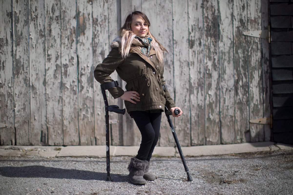 A Toronto restaurant discriminated against a woman who uses mobility devices and "publicly humiliated" her by refusing to let her use its bathroom four years ago, the Human Rights Tribunal of Ontario has ruled. Haily Butler-Henderson is photographed near her Toronto home , Friday, March 17, 2017. 