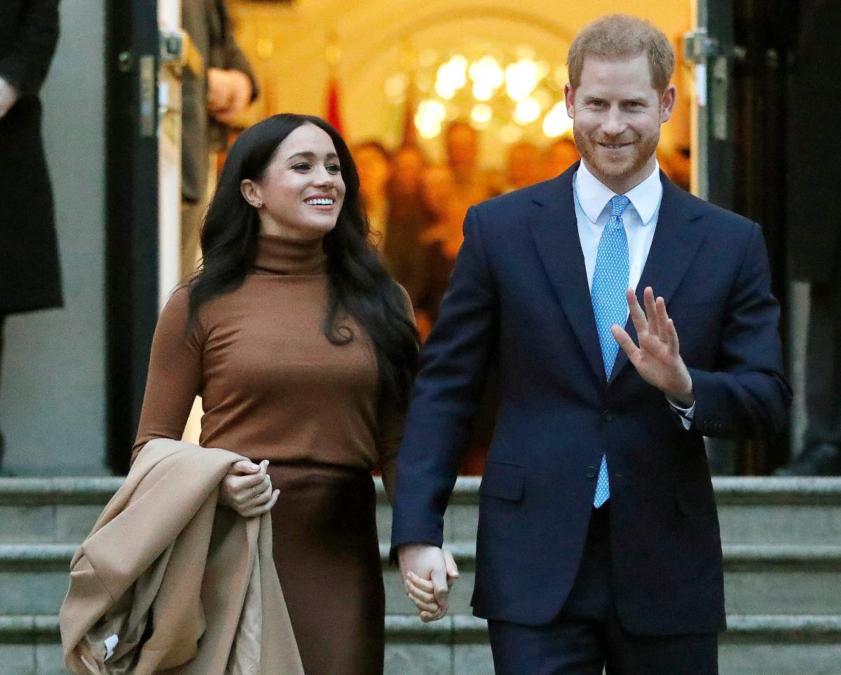 FILE - In this Jan. 7, 2020, file photo, Britain's Prince Harry and Meghan, Duchess of Sussex leave after visiting Canada House in London.