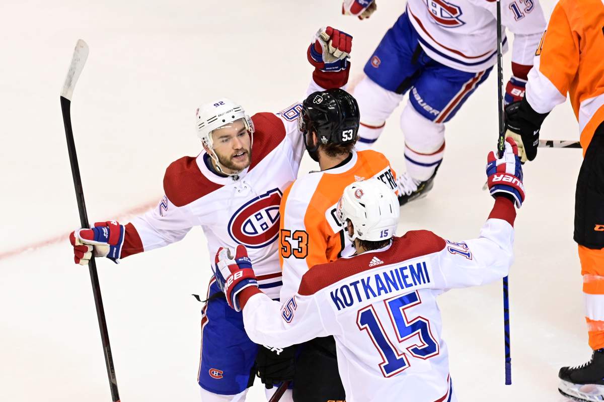 Montreal Canadiens centre Jesperi Kotkaniemi (15) celebrates his goal against the Philadelphia Flyers with teammate Jonathan Drouin (92) as Flyers defenceman Shayne Gostisbehere (53) skates away during the first period of NHL Eastern Conference Stanley Cup first-round playoff action in Toronto on Friday, Aug. 14, 2020.