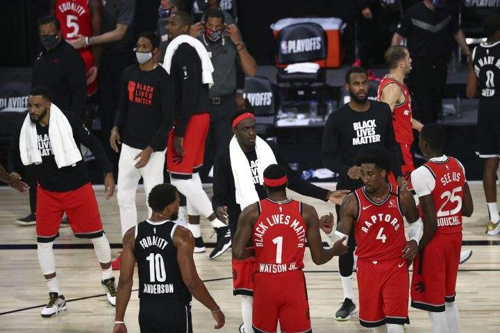 Toronto Raptors forward Pascal Siakam (43) and the Raptors celebrate the game and series victory against the Brooklyn Nets following Game 4 of an NBA basketball first-round playoff series, Sunday, Aug. 23, 2020, in Lake Buena Vista, Fla. 