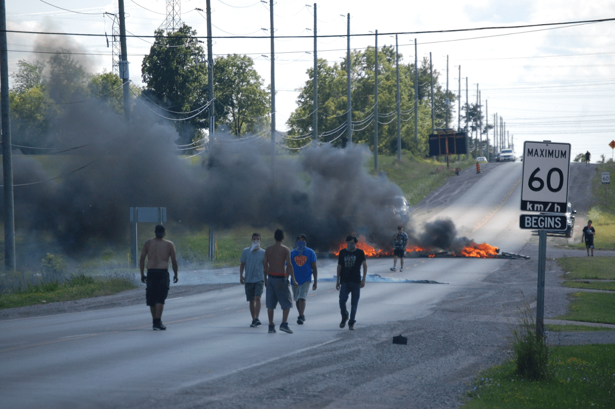 A group of Six Nation residents has re-occupied a residential development in Caledonia following arrests at the site and a pair of blockades set up in solidarity on major routes.