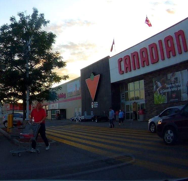 Ottawa police say they're still looking to speak with the three people pictured here in relation to a hit-and-run near an Ottawa Canadian Tire on Friday, July 31, 2020.