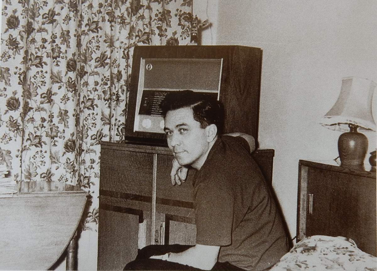 Soviet ‘illegal’ Konon Trofimovich Molody in his London apartment with the radio he used to send messages to Moscow.