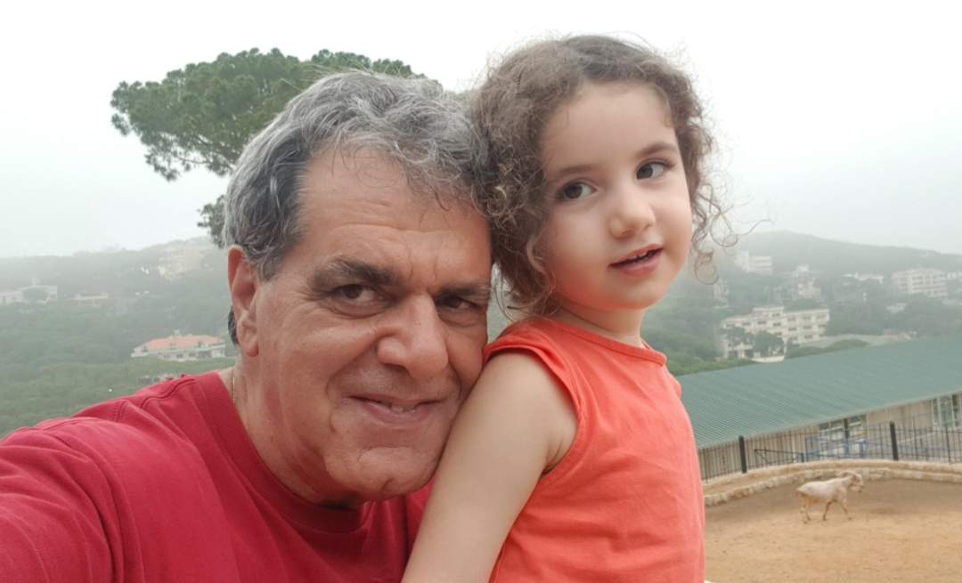 Michel Awad with his granddaughter Alexandra.