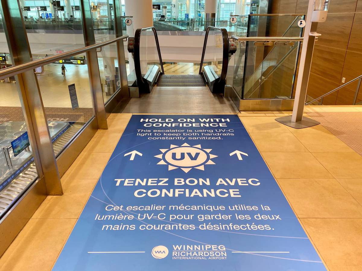 The new escalator signage at the Winnipeg James A. Richardson International Airport.