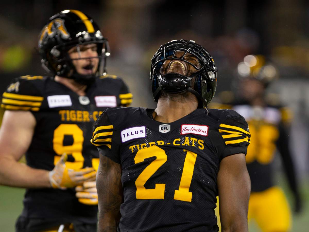 Hamilton Tiger-Cats linebacker Simoni Lawrence celebrates his sack against the Saskatchewan Roughriders during second half CFL football game action in Hamilton, Ont. on Thursday, June 13, 2019.
