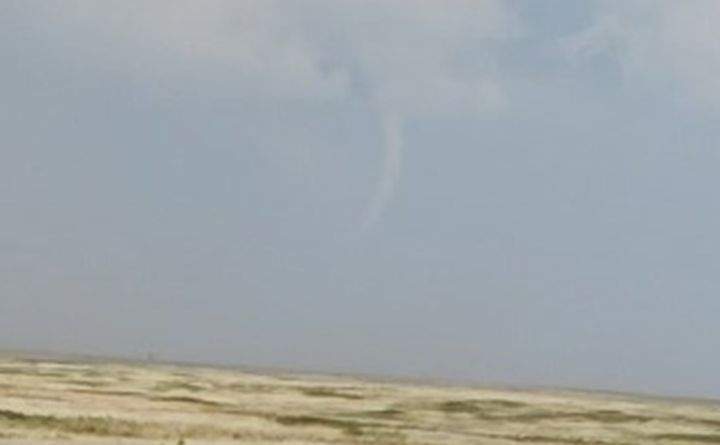 Poi Yee Howard and her husband captured a photo of a funnel cloud near Youngstown, Alta., at about 6:10 p.m. on Monday.