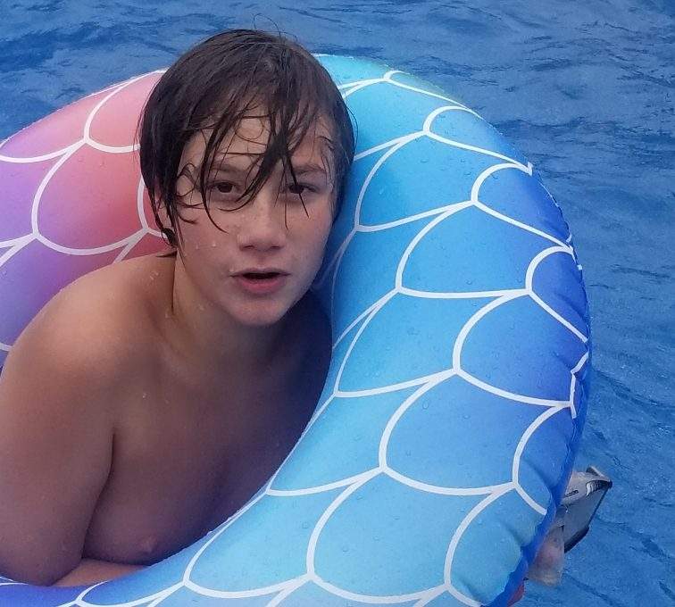 Thirteen-year-old Zavier Bond enjoys a swim in Cape Breton, N.S. during the COVID-19 pandemic.