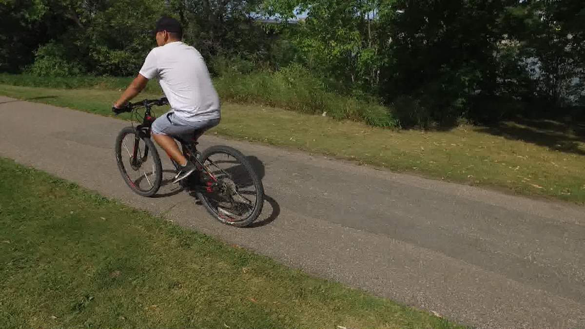 Ellery Lewis biking towards his goal for the Great Cycle Challenge.
