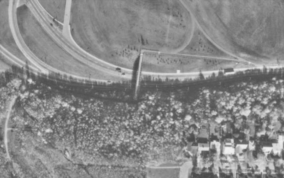 The Connors Road pedestrian bridge in an aerial photo from 1988.